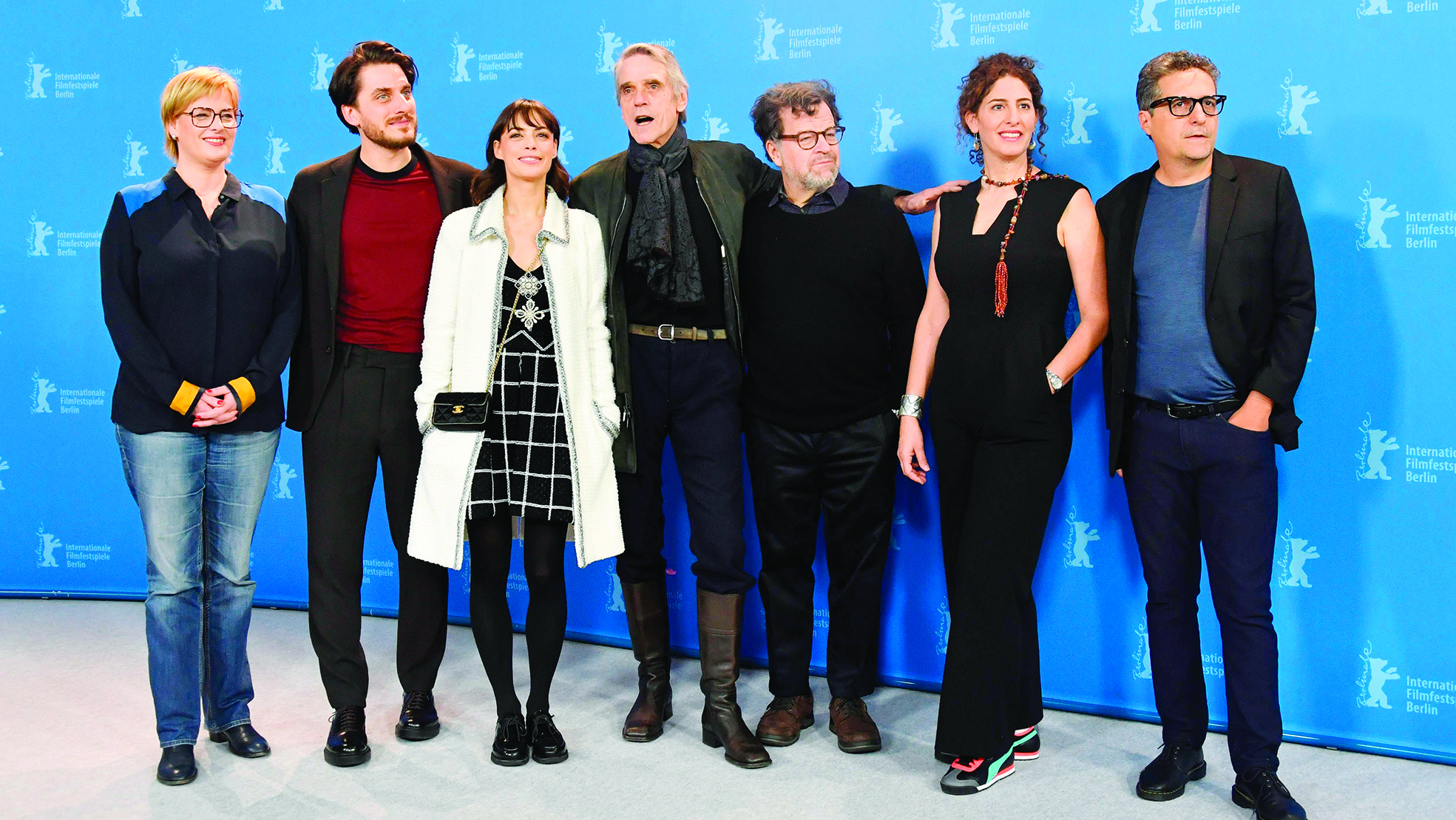 The Berlinale 2020 film festival International Jury (L-R) German film producer Bettina Brokemper, Italian actor Luca Marinelli, French-Argentinian actress Berenice Bejo, Jury director British actor Jeremy Irons, US director Kenneth Lonergan, Palestinian-US film director and writer Annemarie Jacir and Brazilian director Kleber Mendonca Filho pose during a photocall on February 20, 2020, on the day of the official opening of the 70th Berlinale film festival in Berlin. - The 11-day Berlinale, one of Europe's most prestigious film extravaganzas alongside Cannes and Venice, celebrates its 70th anniversary in 2020 and will be running from February 20 to March 1, 2020. (Photo by John MACDOUGALL / AFP)