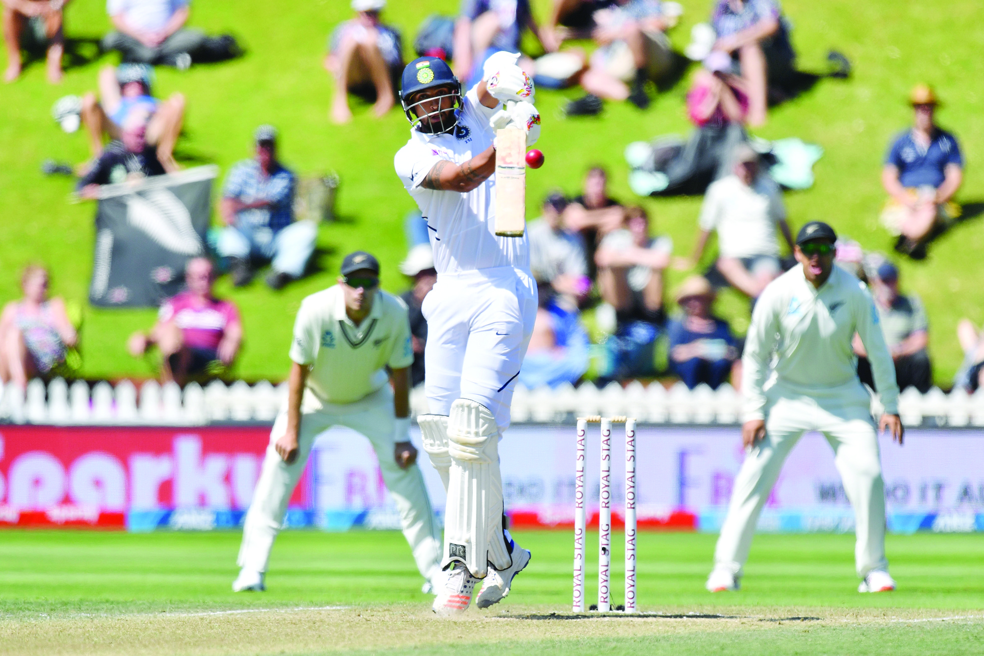 India's Ishant Sharma plays a shot during day four of the first Test cricket match between New Zealand and India at the Basin Reserve in Wellington on February 24, 2020. (Photo by Marty MELVILLE / AFP)