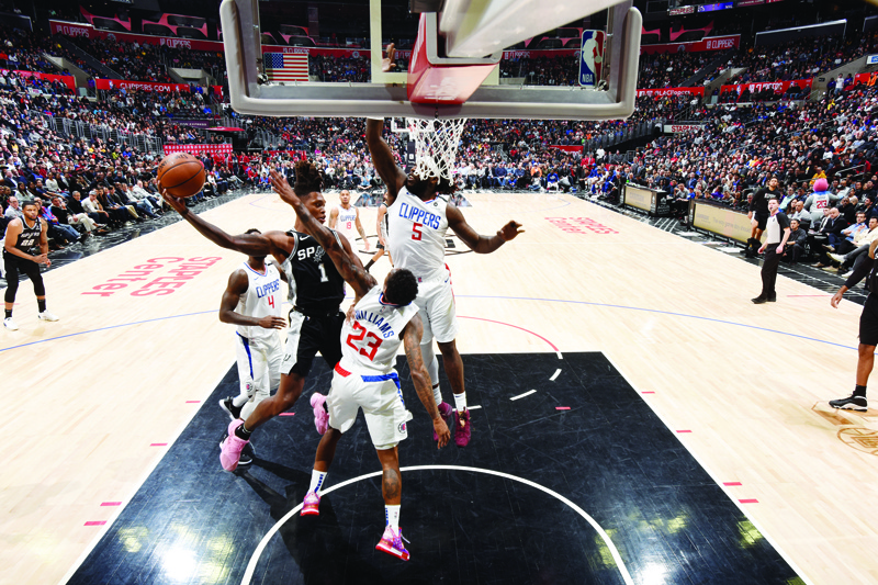 LOS ANGELES, CA - FEBRUARY 3: Lonnie Walker IV #1 of the San Antonio Spurs drives to the basket against the LA Clippers on February 3, 2020 at STAPLES Center in Los Angeles, California. NOTE TO USER: User expressly acknowledges and agrees that, by downloading and/or using this Photograph, user is consenting to the terms and conditions of the Getty Images License Agreement. Mandatory Copyright Notice: Copyright 2020 NBAE   Andrew D. Bernstein/NBAE via Getty Images/AFP