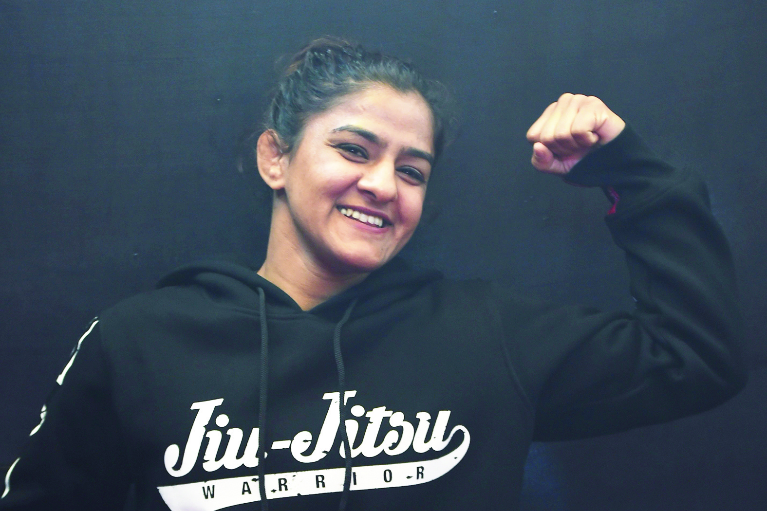 In this photograph taken on on February 12, 2020, Indian mixed martial arts (MMA) fighter Ritu Phogat poses for a picture during an interview with AFP, in New Delhi. - Indian wrestler Rita Phogat whose family story was immortalised by Bollywood is hoping to create a blockbuster of her own by becoming her country's first world champion in the high-octane sport of mixed martial arts. (Photo by Money SHARMA / AFP) / TO GO WITH MMA-IND-Phogat-wrestling,FOCUS by Faisal KAMAL