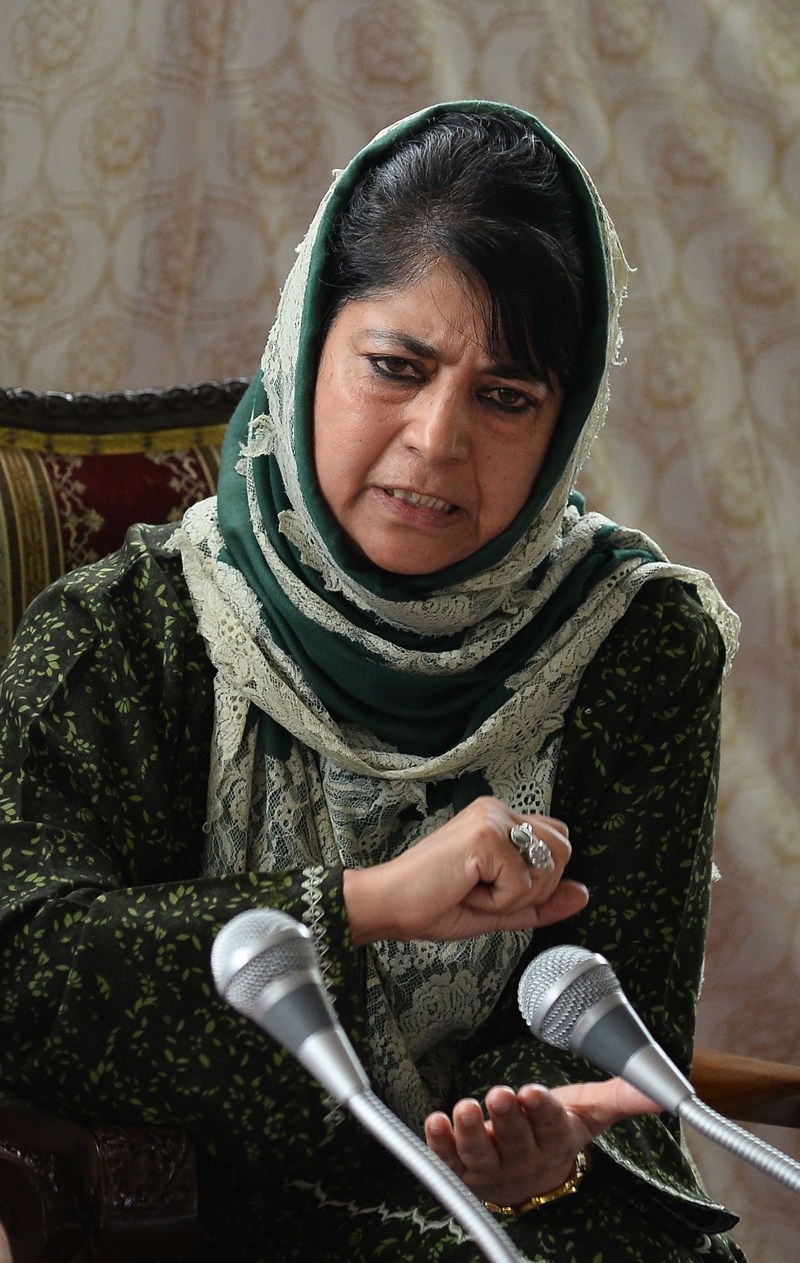 (FILES) In this file photo taken on August 25, 2016 Chief minister of Jammu and Kashmir, Mehbooba Mufti addresses a joint press conference with Indian home minister Rajnath Singh in Srinagar. - Two former chief ministers of Indian Kashmir held for the past six months have now been booked under a contentious law allowing them to be detained up to two years without charge, police said on February 7. (Photo by SAJJAD HUSSAIN / AFP)