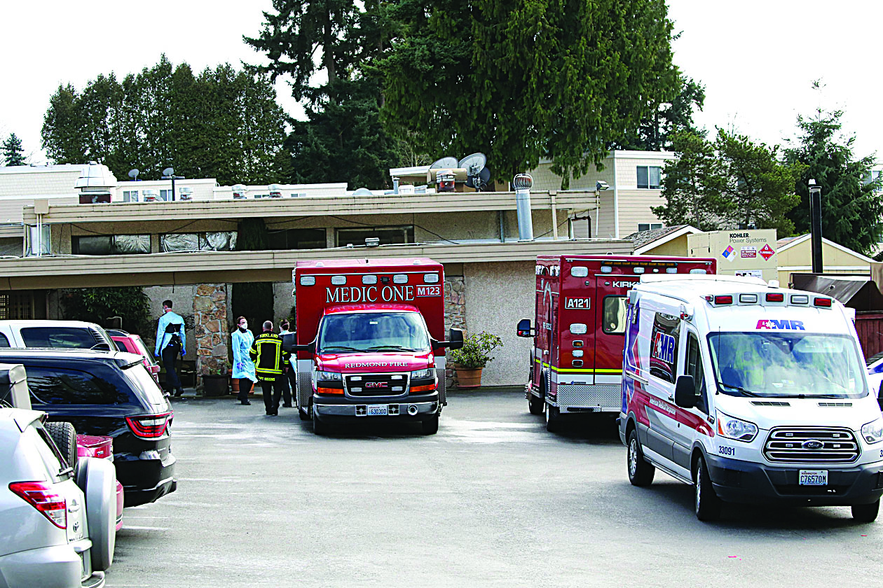 KIRKLAND, WA - MARCH 07: Several ambulances arrive at the Life Care Center on March 7, 2020 in Kirkland, Washington. Several residents have died from COVID-19 and six others have tested positive for the novel coronavirus symptoms   Karen Ducey/Getty Images/AFPn== FOR NEWSPAPERS, INTERNET, TELCOS &amp; TELEVISION USE ONLY ==