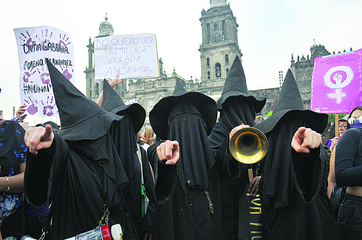 Women take part in a protest during the International Women's Day, in Mexico City, on March 8, 2020. - Women around the globe are taking action to mark International Women's Day and to push for action to obtain equality. (Photo by ROCIO VAZQUEZ / AFP)