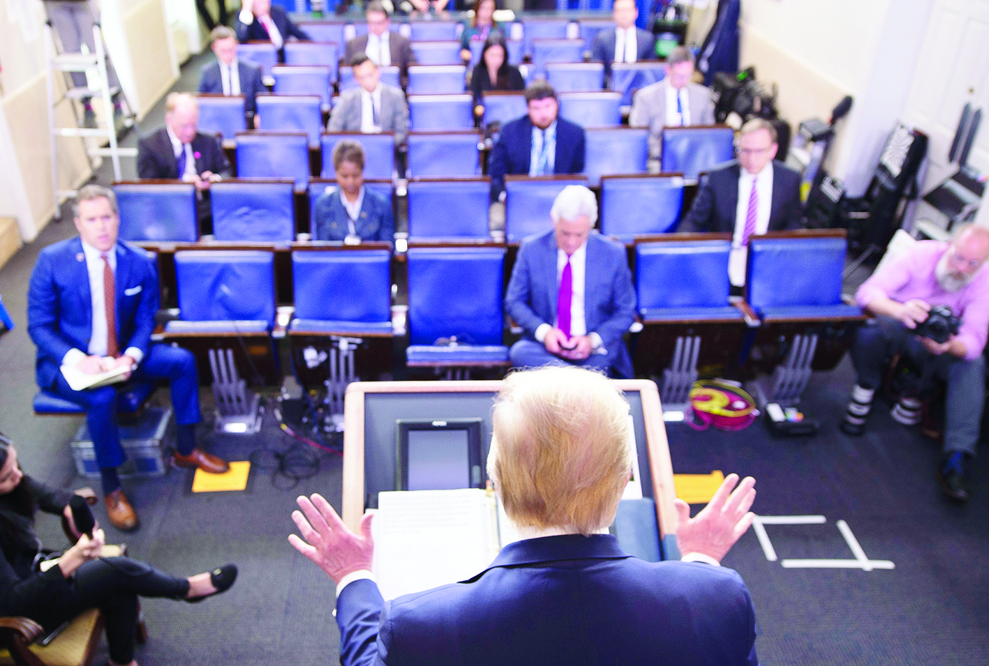 US President Donald Trump gestures as he speaks during the daily briefing on the novel coronavirus, COVID-19, in the Brady Briefing Room at the White House on March 27, 2020, in Washington, DC. (Photo by JIM WATSON / AFP)
