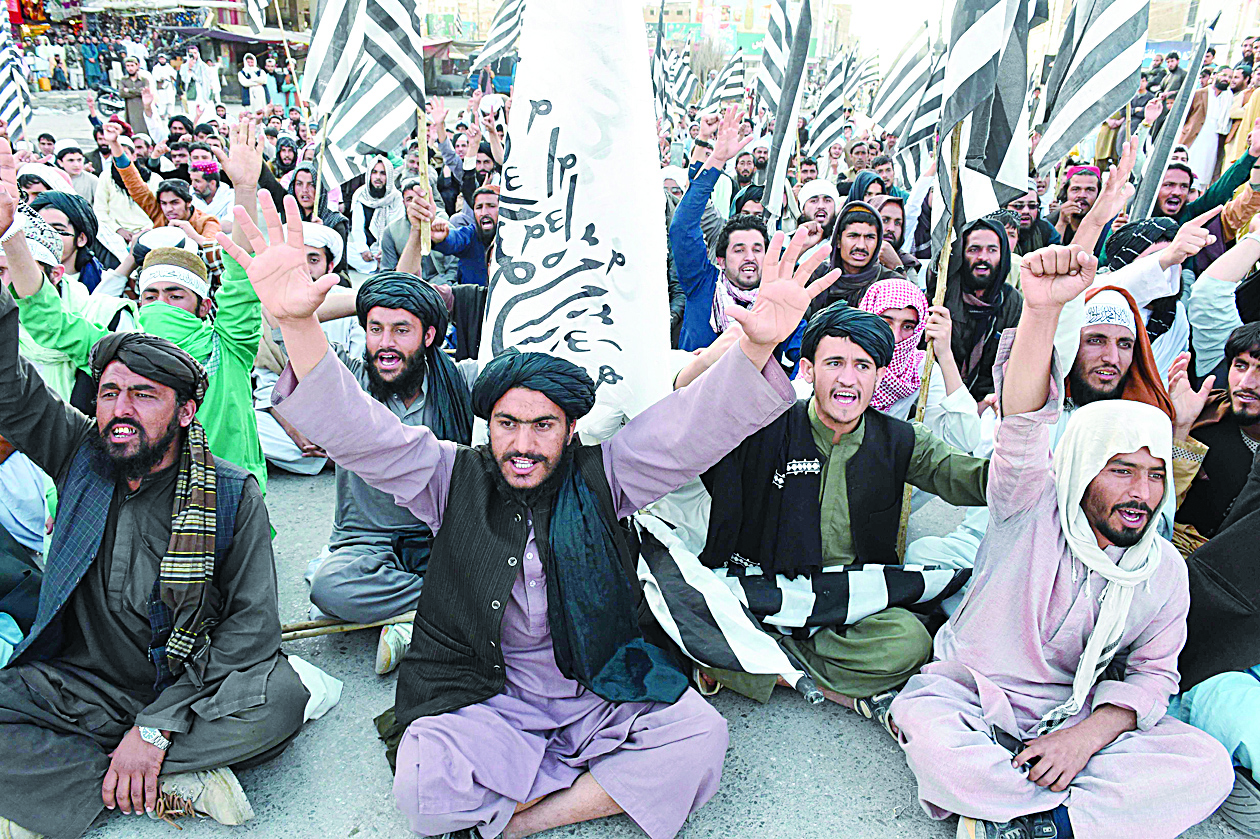 Activists of Jamiat Ulema-e Islam Nazryate party shout as they celebrate the signing agreement between the US and the Taliban during a rally in Quetta on March 1, 2020.† †nn† - The United States signed a landmark deal with the Taliban on February 29, laying out a timetable for a full troop withdrawal from Afghanistan within 14 months as it seeks an exit from its longest war. (Photo by Banaras KHAN / AFP)