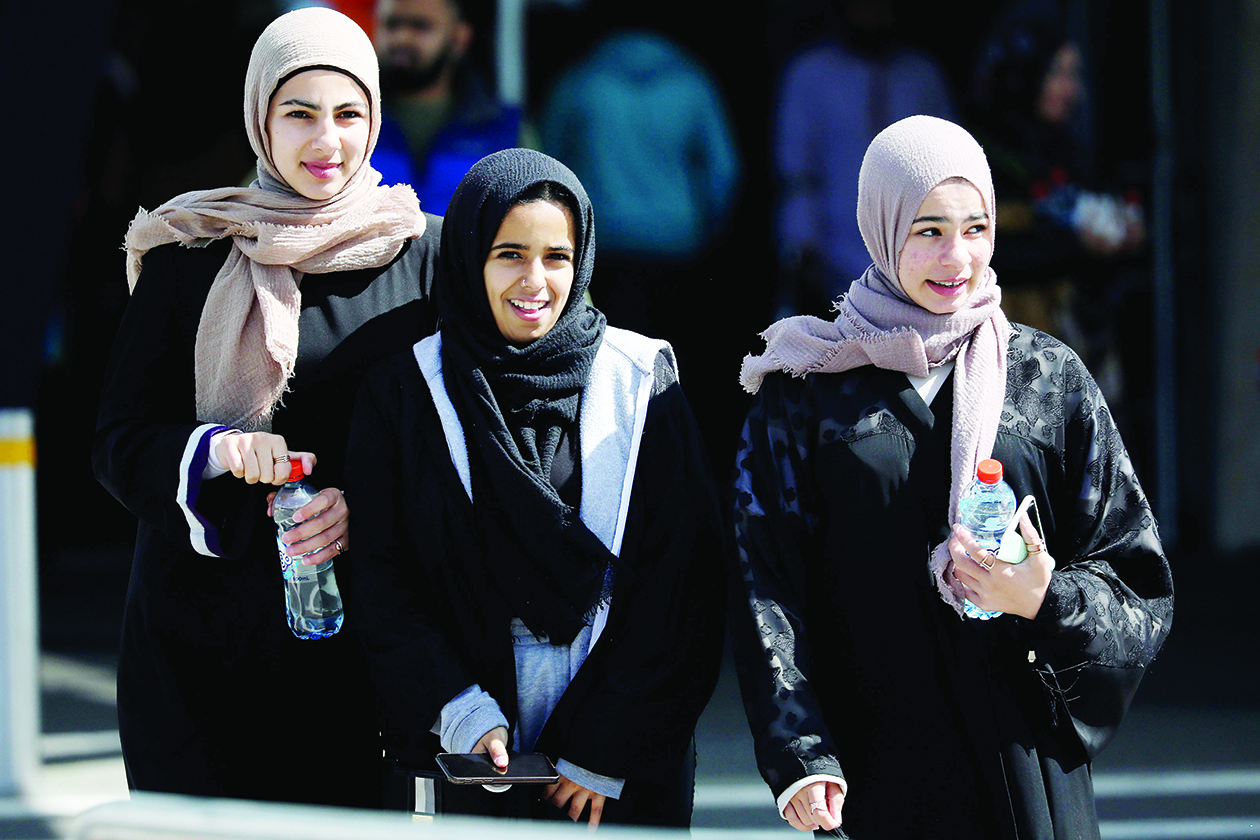 Members of the Muslim community Jood Almutairi (R), Alaa Fouda (C) and Nada Fouda (L) leave after attending congregational Friday prayers, two days ahead of the first†anniversary of the Christchurch mosque shootings, at Horncastle Arena in Christchurch on March 13, 2020. - The mass shootings which killed 51 Muslim worshippers at two mosques on March 15 last year was carried out by an avowed white supremacist who had slipped under the radar of New Zealand authorities. (Photo by Sanka VIDANAGAMA / AFP)