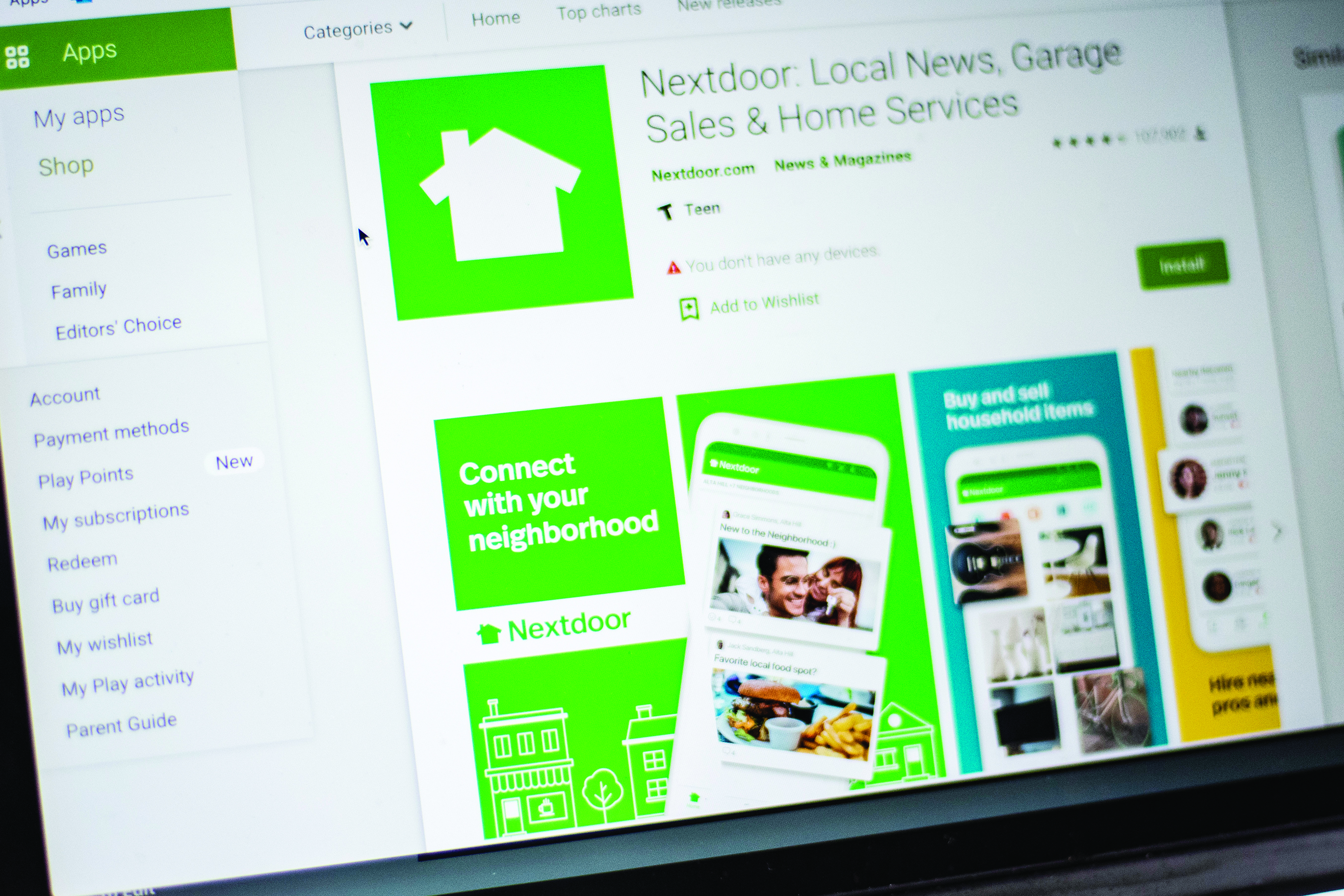 Nextdoor, the hyper local social network, is seen on a computer screen in Washington, DC, on March 27, 2020. - There are offers to pick up groceries or medicine for neighbors, to share supplies, or walk people's dogs. And exchange information on where to find scarce items like toilet paper.  For people forced to stay home to ride out the coronavirus pandemic, Nextdoor, the hyperlocal social network, has found itself playing an increasingly important role. (Photo by Eric BARADAT / AFP)