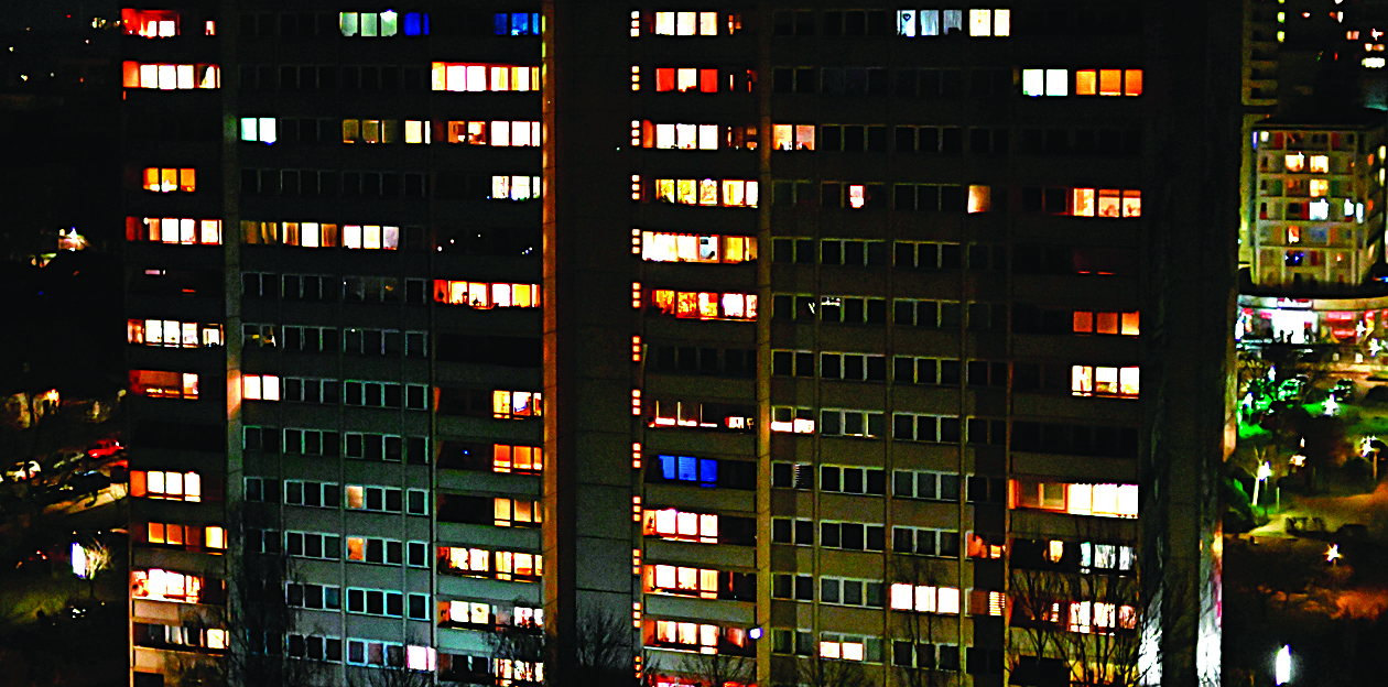 An Appartement building is pictured in Berlin on March 27, 2020. - With families across Europe confined to their homes to curb the spread of the novel coronavirus, fears are rising of a surge in domestic violence. From Berlin to Paris, Madrid, Rome and Bratislava, associations that help victims of domestic violence have been sounding the alarm after Europe overtook China to become the epicentre of the pandemic. (Photo by Tobias SCHWARZ / AFP)