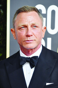 (FILES) In this file photo taken on January 05, 2020 Daniel Craig attends the 77th Annual Golden Globe Awards at The Beverly Hilton Hotel in Beverly Hills, California. - The makers of the new James Bond movie due for global release next month said on Wednesday it would be delayed until November amid fears over the coronavirus outbreak. (Photo by Frazer Harrison / GETTY IMAGES NORTH AMERICA / AFP)