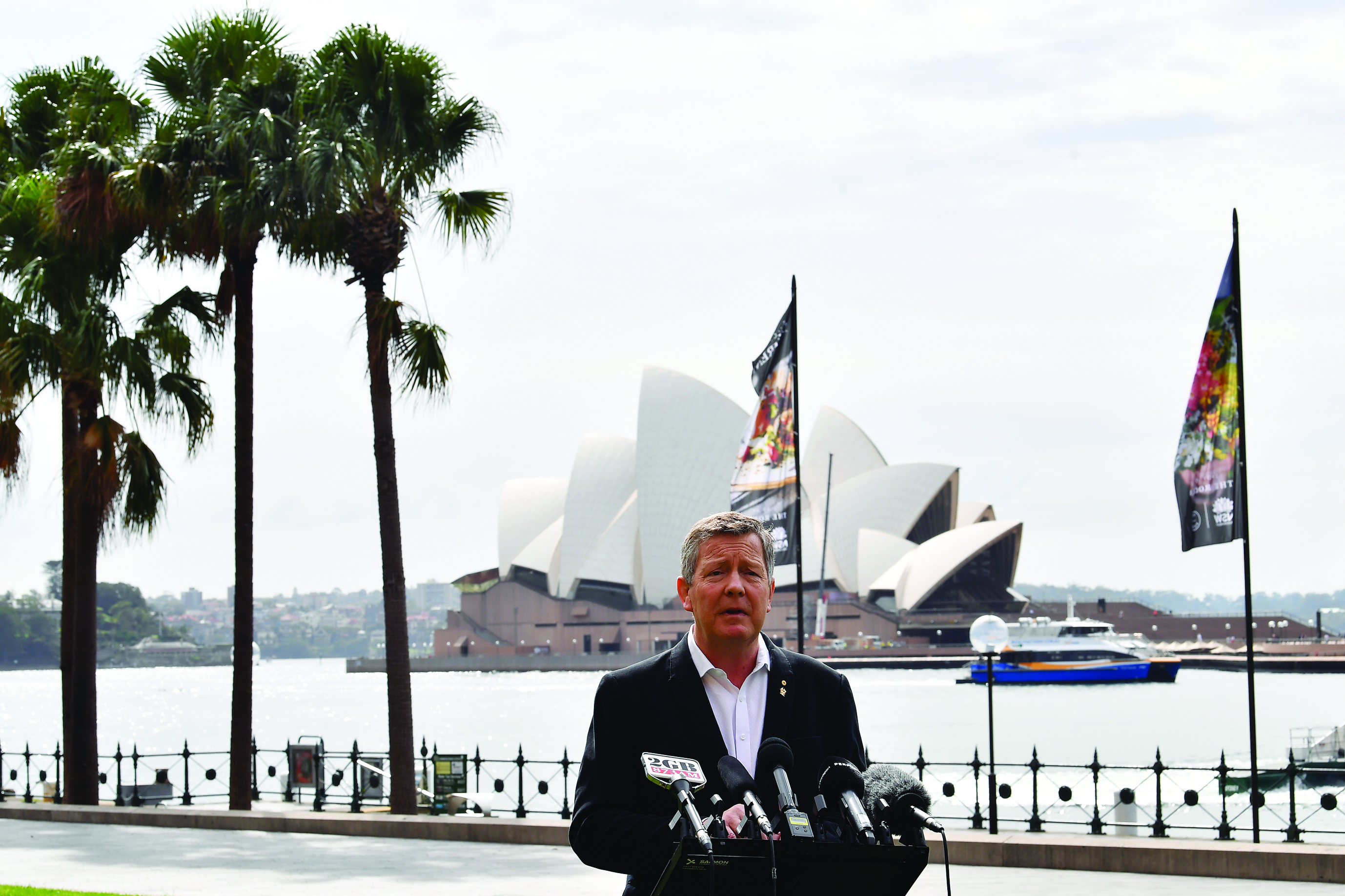 Australian Olympic Committee chief executive Matt Carroll speaks at a press conference at Circular Quay in Sydney on March 25, 2020, the morning after the historic decision to postpone the 2020 Tokyo Olympic Games. (Photo by SAEED KHAN / AFP) / -- IMAGE RESTRICTED TO EDITORIAL USE - STRICTLY NO COMMERCIAL USE --