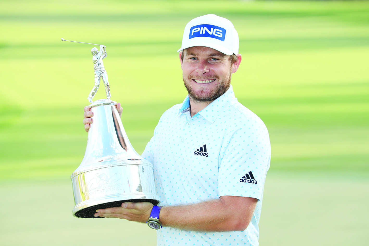 ORLANDO, FLORIDA - MARCH 08: Tyrrell Hatton of England celebrates with the trophy after winning during the final round of the Arnold Palmer Invitational Presented by MasterCard at the Bay Hill Club and Lodge on March 08, 2020 in Orlando, Florida.   Sam Greenwood/Getty Images/AFP