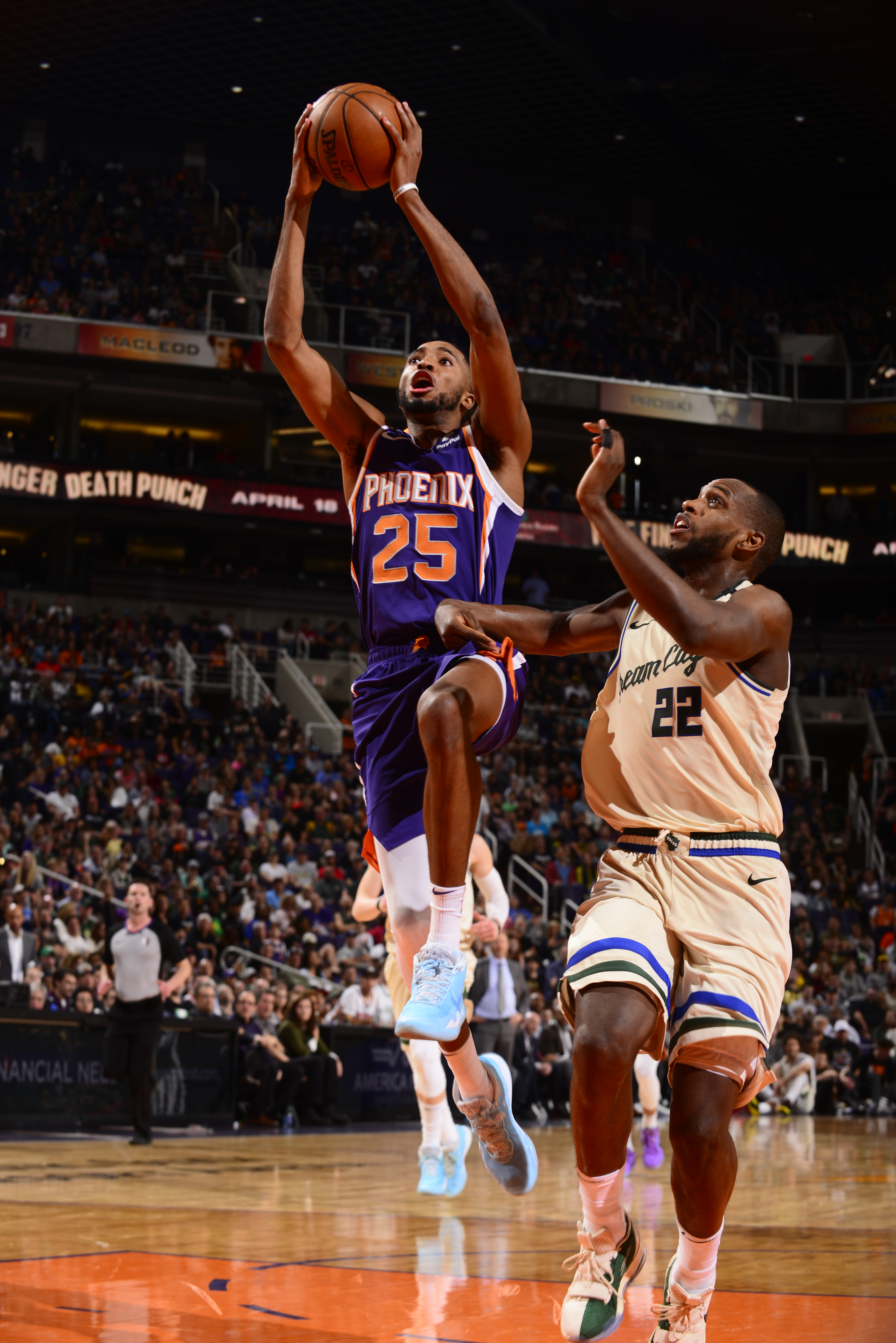 PHOENIX, AZ - MARCH 8: Mikal Bridges #25 of the Phoenix Suns shoots the ball against the Milwaukee Bucks on March 8, 2020 at Talking Stick Resort Arena in Phoenix, Arizona. NOTE TO USER: User expressly acknowledges and agrees that, by downloading and or using this photograph, user is consenting to the terms and conditions of the Getty Images License Agreement. Mandatory Copyright Notice: Copyright 2020 NBAE   Barry Gossage/NBAE via Getty Images/AFP