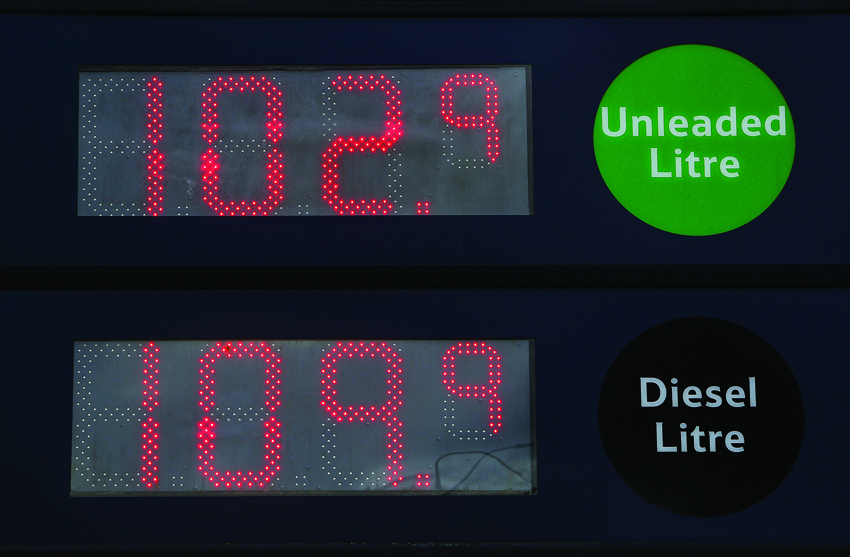 An electronic display board shows the price in pence per litre for petrol and diesel fuels, at a Tesco supermarket in Cardiff, south Wales, on March 30, 2020, as life in Britain continues during the nationwide lockdown to combat the novel coronavirus pandemic. - Oil prices plunged Monday as the number of novel coronavirus cases worldwide surged past 700,000, reinforcing worries about the impact on the global economy. Crude oil struck the lowest levels in more than 17 years on Monday, with Brent North Sea tumbling to $22.58 per barrel at one point. (Photo by GEOFF CADDICK / AFP)