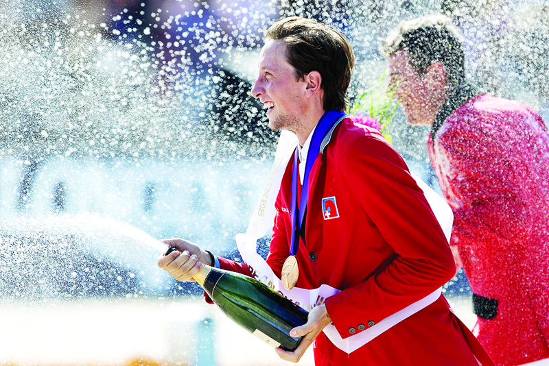 (FILES) In this file photo taken on August 25, 2019 Switzerland's Martin Fuchs celebrates after winning the individual final day at the European Jumping Championships in Rotterdam, the Netherlands. - Martin Fuchs was aiming to become the first from his Swiss showjumping family to be crowned an Olympic champion in Tokyo. But he is relishing his enforced break from his usual relentless schedule. (Photo by Olaf KRAAK / ANP / AFP)