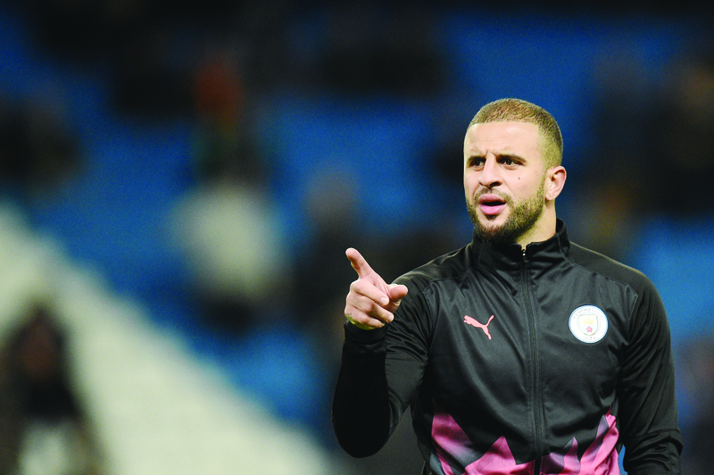 (FILES) In this file photo taken on November 26, 2019 Manchester City's English defender Kyle Walker gestures during the UEFA Champions League football Group C match between Manchester City and Shakhtar Donetsk at the Etihad Stadium in Manchester, north west England. - Kyle Walker is facing disciplinary action from Manchester City despite apologising after breaching coronavirus lockdown conditions even though he advised people to stay at home. (Photo by Oli SCARFF / AFP)