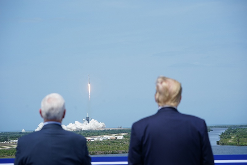 CAPE CANAVERAL, Florida: US Vice President Mike Pence and US President Donald Trump watch the SpaceX Falcon 9 rocket carrying the SpaceX Crew Dragon capsule lift off from Kennedy Space Center in Florida on Saturday. – AFP