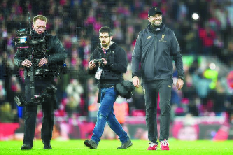 (LIVERPOOL: File photo shows a television camera operator films Liverpool's German manager Jurgen Klopp following the English Premier League football match between Liverpool and Arsenal at Anfield. Premier League clubs face having to pay a huge refund to broadcasters even if they manage to complete the coronavirus-disrupted season behind closed doors. Broadcasters would be reimbursed for matches not being played as scheduled and the lack of atmosphere in empty stadiums is also a factor. – AFP