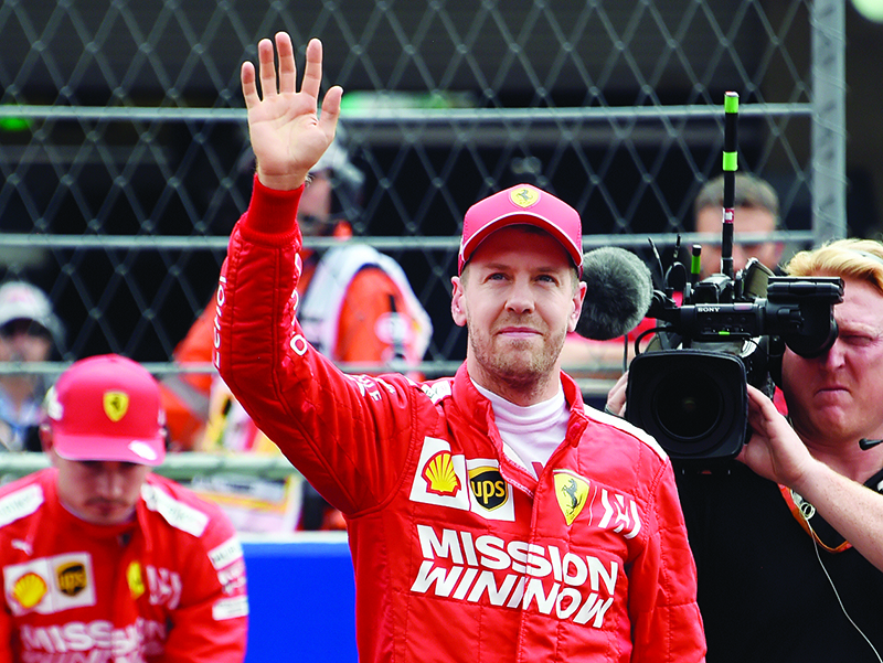 MEXICO CITY: File photo taken on October 26, 2019 Ferrari’s German driver Sebastian Vettel waves after finishing on third position during the F1 Mexico Grand Prix qualifying session at the Hermanos Rodriguez circuit in Mexico City. Vettel will leave Ferrari at the end of the 2020 season, AFP reports on May 12, 2020. —AFP