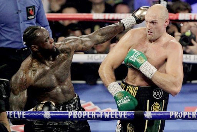 File photo shows Tyson Fury beat Deontay Wilder in their second fight in February.