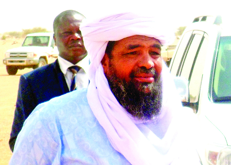 In this file photo, Iyad Ag Ghali, leader of the Islamic group of Ansar Dine, looks on at in Kidal airport before a meeting with Burkina Faso’s foreign Minister Djibrille Bassole. – AFP