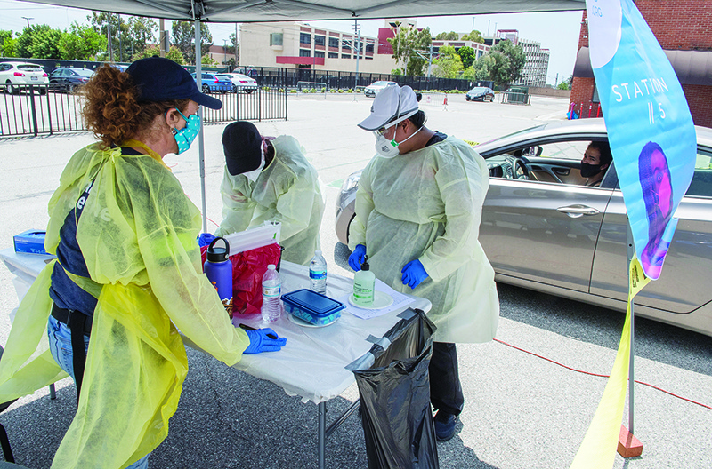 CALIFORNIA: Medical staff from myCovidMD provide free COVID-19 virus antibody testing in observance of Juneteenth at the Faith Central Bible Church, in the predominately African American city of Inglewood, California. — AFP