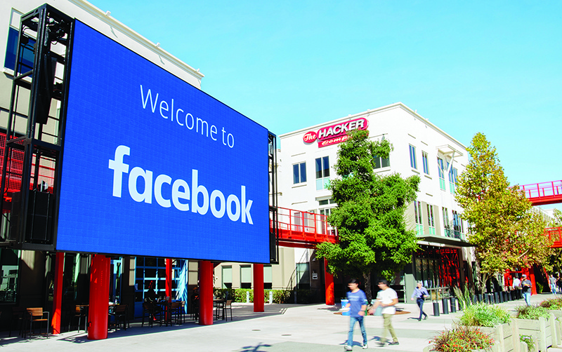 CALIFORNIA: A giant digital sign is seen at Facebook’s corporate headquarters campus in Menlo Park, California. —AFP