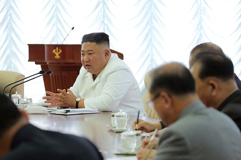 In this picture taken on June 7, 2020 and released from North Korea’s official Korean Central News Agency (KCNA). North Korean leader Kim Jong Un (C) speaks during the 13th Political Bureau meeting of the 7th Central Committee of the Workers’ Party of Korea (WPK) in an undisclosed location in North Korea. — AFP
