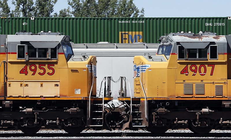 SALT LAKE CITY: In this file photo, Union Pacific train engines face each other as they sit idle at a train yard in Salt Lake City, Utah. Despite moves to reopen businesses, another 1.54 million US workers filed for unemployment benefits last week, the Labor Department said.—AFP