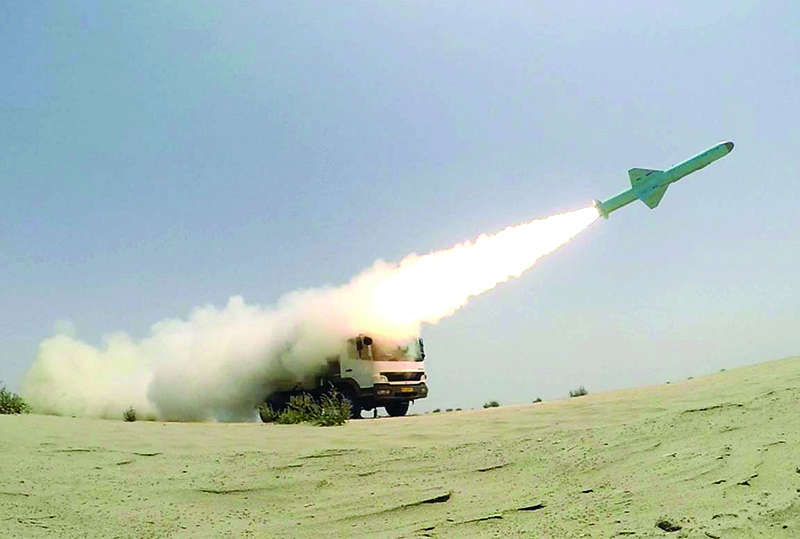 This picture made available by the Iranian armed forces office on June 18, 2020 shows a missile being fired out to sea from a mobile launch vehicle reportedly on the southern coast of Iran along the Gulf of Oman during a military exercise. — AFP