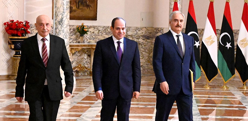 CAIRO: Egyptian President Abdel Fattah Al-Sisi (center), Libyan commander Khalifa Haftar (right) and Libyan Parliament Speaker Aguila Saleh arrive for a joint press conference on Saturday. — AFP