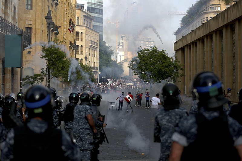 BEIRUT: Lebanese riot police fire tear gas at protesters in central Beirut on Saturday. — AFP