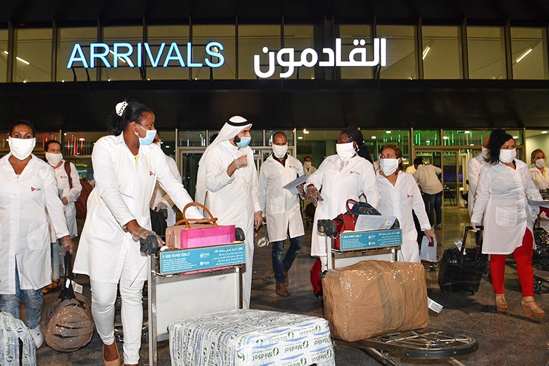 KUWAIT: Cuban medical personnel arrive at Kuwait International Airport on Saturday to assist the country’s effort in the fight against COVID-19. — Photo by Yasser Al-Zayyat
