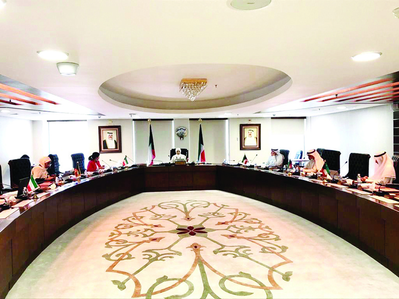 KUWAIT: Kuwait’s Minister of Social Affairs and Minister of State for Economic Affairs Mariam Al-Aqeel and other ministry officials attend the videoconference. — KUNA