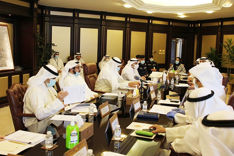 KUWAIT: The Higher Committee for Re-operating Flights at Kuwait International Airport meeting in progress. — KUNA