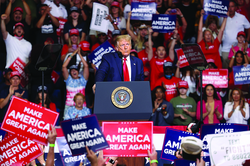 TULSA, OKLAHOMA - JUNE 20: U.S. President Donald Trump speaks at a campaign rally at the BOK Center, June 20, 2020 in Tulsa, Oklahoma. Trump is holding his first political rally since the start of the coronavirus pandemic at the BOK Center today while infection rates in the state of Oklahoma continue to rise.   Win McNamee/Getty Images/AFP