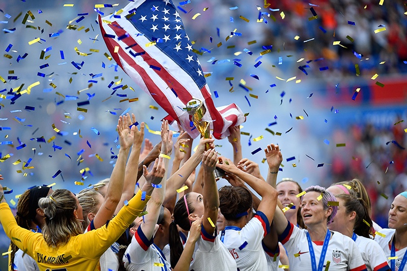 LYON: This file photo taken on July 7, 2019 shows US’s players celebrating with the trophy after the France 2019 Women’s World Cup football final match between USA and the Netherlands at the Lyon Stadium in Lyon, central-eastern France. Australia and New Zealand’s joint bid to host the 2023 women’s World Cup, using the slogan “As One”, is up against Colombia, with the decision due on June 25 after the field was whittled down from 10. — AFP