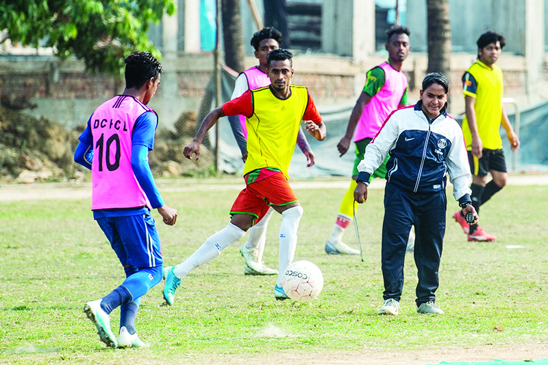 DHAKA: In this photo taken on February 5, 2020, head coach of Dhaka Football City Club, Mirona (R), reacts as she trains players on a field on the outskirts of Dhaka.  —AFP