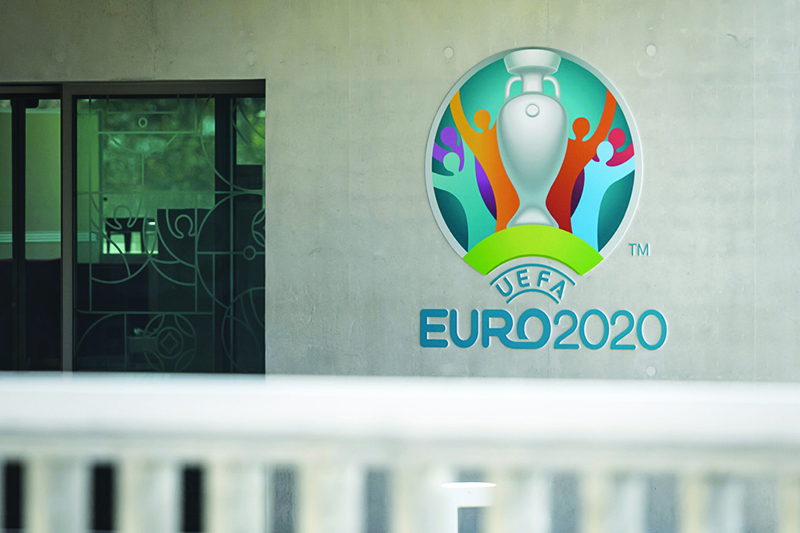 NYON: File photo taken on March 17, 2020 in Nyon shows the Euro 2020 logo at the headquarters of UEFA, the European football’s governing body, amid spread of novel coronavirus (COVID-19). D-365 before Euro-2020, which should have started on June 12, 2020, and has been rescheduled to 2021 after UEFA postponing the European Championship due to the novel coronavirus. —AFP