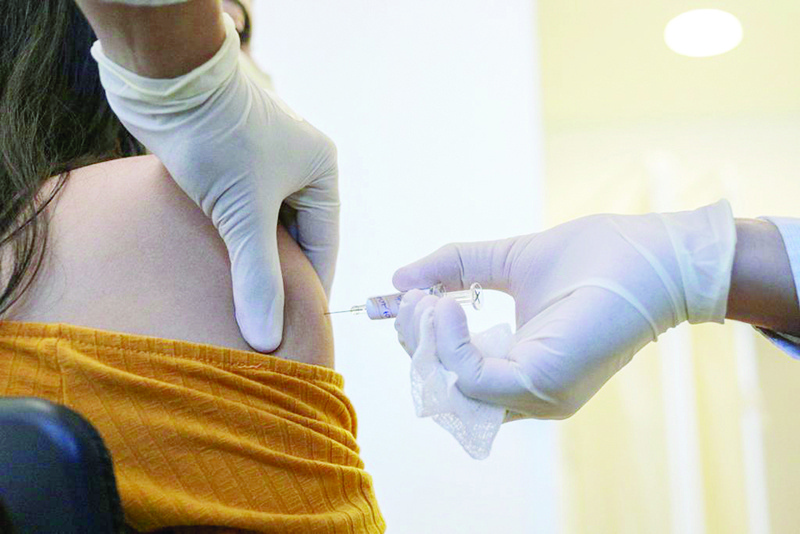 SAO PAULO: A volunteer receives the COVID-19 vaccine during the trial stage of the vaccine produced by the Chinese company Sinovac Biotech at the Hospital das Clinicas (HC) in Sao Paulo state, Brazil. —AFP