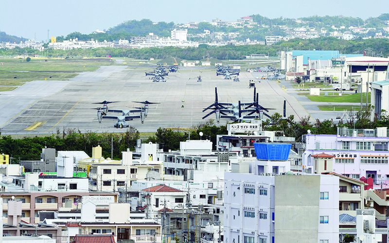 OKINAWA PREFECTURE: Photo shows multi-mission tiltrotor Osprey aircraft at the US Marine’s Camp Futenma in a crowded urban area of Ginowan, Okinawa prefecture. — AFP