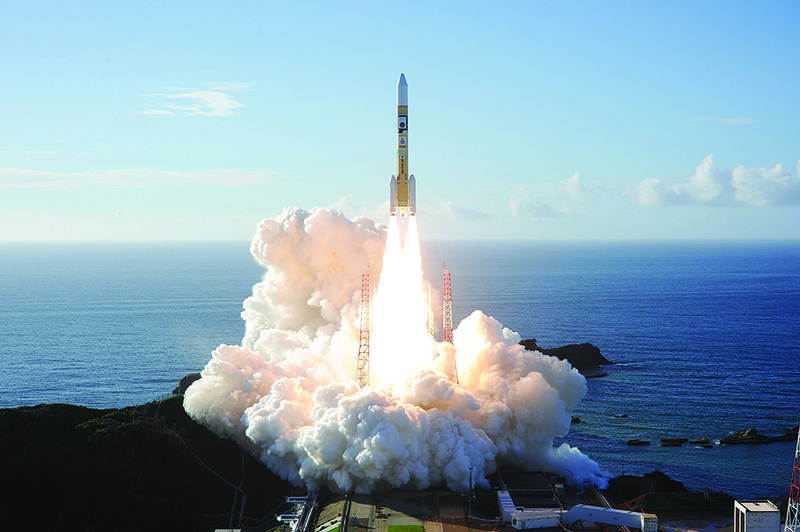 TANEGASHIMA, Japan: An H-2A rocket carrying the “Hope” probe blasts off from Tanegashima Space Centre yesterday. — AFP