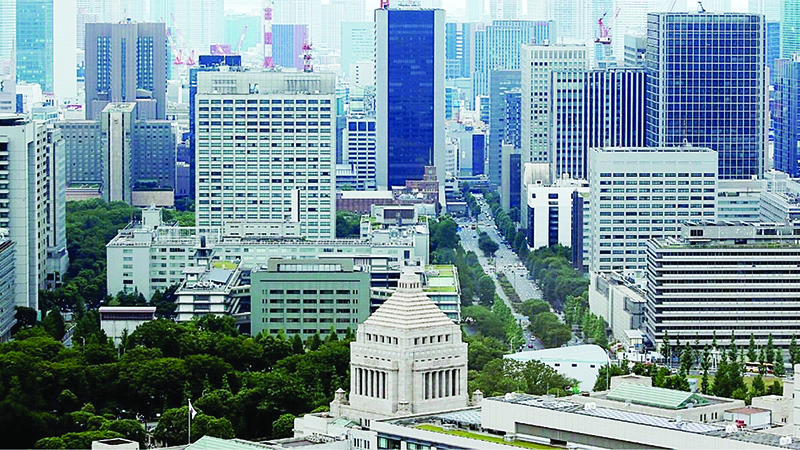 TOKYO: In this file photo, parliament building (bottom) is seen in front of office buildings of government ministries in Tokyo. — Reuters