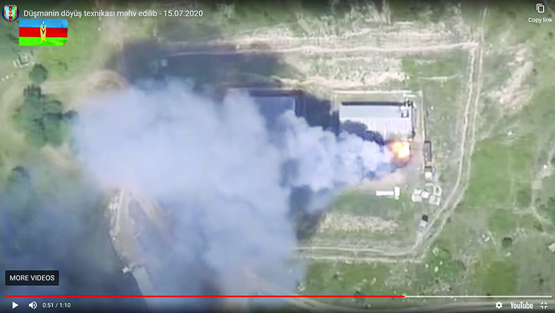 An image grab taken from a video uploaded on YouTube by the Azerbaijani Defense Ministry, allegedly shows smoke billowing from what they said was destroyed Armenia’s military equipment on the Azerbaijani-Armenian border. — AFP