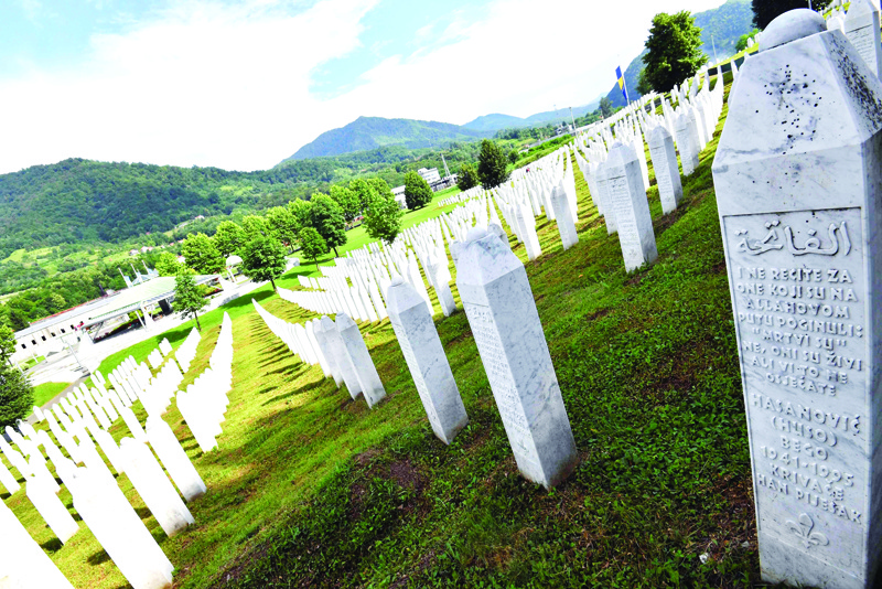 A picture taken on July 3, 2020 shows tombstones of victims of the massive killing of Srebrenica during Bosnia's 1992-95 war, at Potocari memorial center, near Srebrenica. - Eight thousands Muslim men and boys were killed by Serb forces in the eastern enclave towards the end of Bosnia's 1992-95 war, an atrocity deemed a genocide by international courts, whose remains were found in mass graves after the conflict, were buried a decade ago in the memorial centre where more than 6,600 victims of the victims lie.nAnother 237 have been laid to rest at other sites. But more than 1,000 people have never been found, an acute source of pain for survivors. (Photo by ELVIS BARUKCIC / AFP)