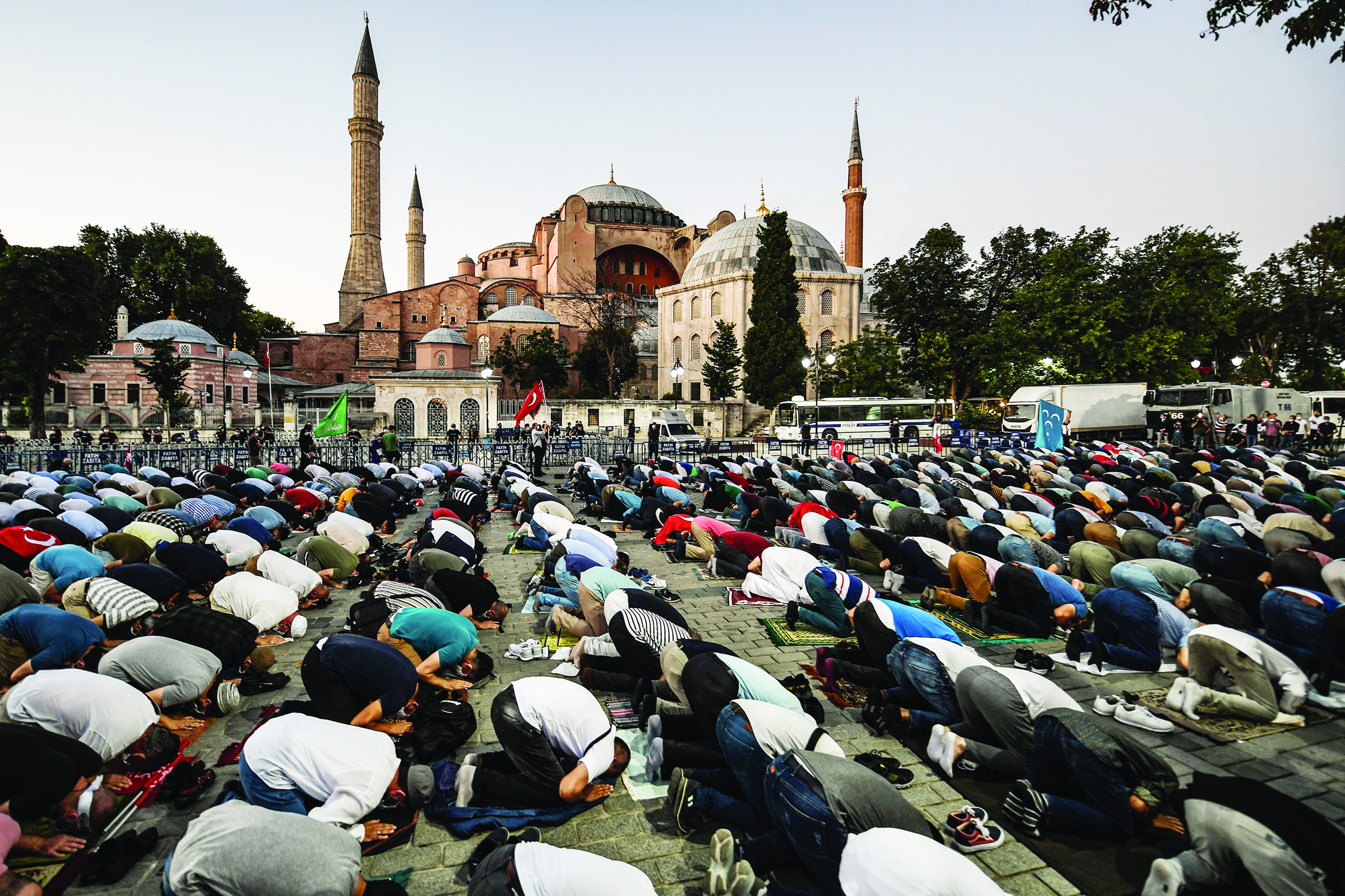 ISTANBUL: People pray outside the Hagia Sophia on Friday as they gather to celebrate after a top Turkish court revoked its status as a museum, clearing the way for it to be turned back into a mosque. — AFP