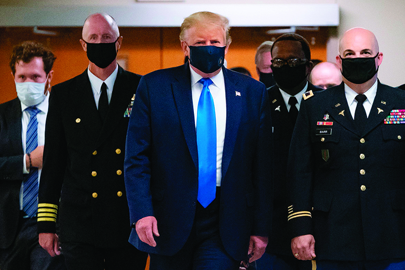 BETHESDA, Maryland: US President Donald Trump wears a mask as he visits Walter Reed National Military Medical Center on Saturday. — AFP
