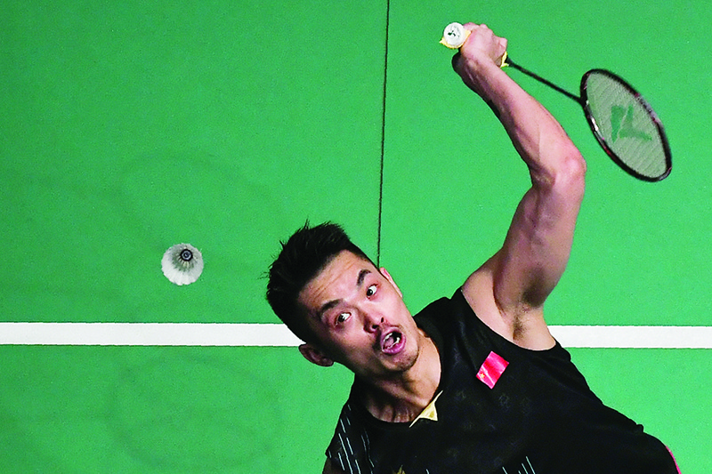 KUALA LUMPUR: File photo taken on April 5, 2019 shows China’s Lin Dan hitting a return against Japan’s Kanta Tsuneyama during their men’s singles quarter-final match. China’s two-time Olympic badminton champion Lin Dan announced his retirement in a social media post on July 4, 2020, thanking his family and fans. — AFP.