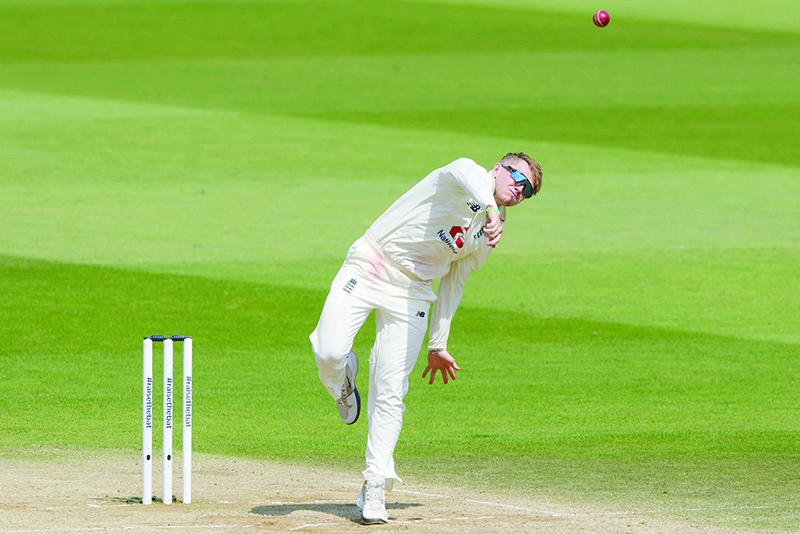 SOUTHAMPTON: England’s Dom Bess bowls on the fifth day of the first Test cricket match between England and the West Indies at the Ageas Bowl in Southampton, southwest England. — AFP