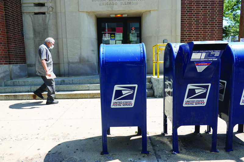 CHICAGO, ILLINOIS - AUGUST 13: Mail boxes sit in front of a United State Postal Service facility on August 13, 2020 in Chicago, Illinois. President Donald Trump said today that he opposes additional funding for the Postal Service because the lack of additional funding would make it more difficult to deliver mail-in ballots.   Scott Olson/Getty Images/AFPn== FOR NEWSPAPERS, INTERNET, TELCOS &amp; TELEVISION USE ONLY ==