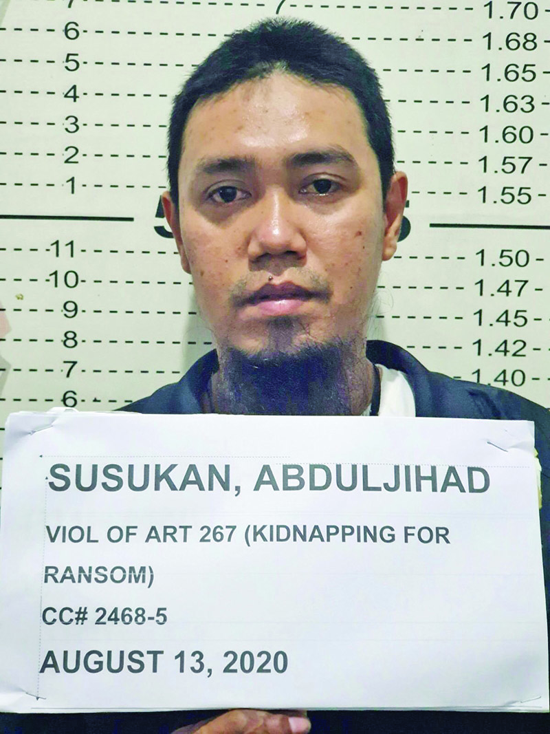 In this undated handout photo received yesterday by the Philippine National Police (PNP-PIO), Abu Sayyaf leader Abduljihad Susukan has his mug shot taken after his arrest in Davao City, in southern island of Mindanao.  — AFP